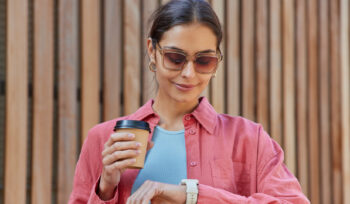 Woman watch coffee - Cubit IT Support Services London