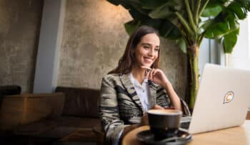 woman-using-laptop-coffee-shop