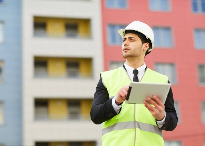 construction company communicating ipad device