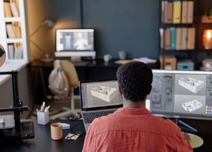 hybrid work architectural firm multiple screens office